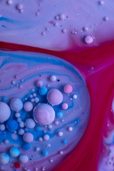 abstract background of stains and paint bubbles in liquid