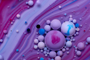abstract background of stains and paint bubbles in liquid