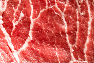 Texture or background of tasty fresh meat. Red beef meat close up texture. Meat food background.