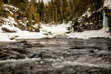 Rushing winter water in glacier national park