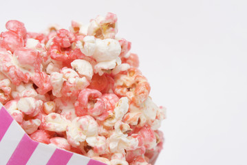 strawberry popcorn in cup with white background
