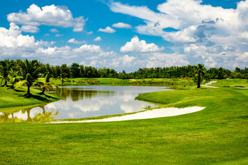 Beautiful fairway  sand bunkers and lake  in the golf course  northern of Thailand with sky background - 254598631