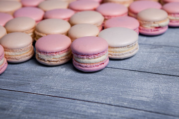 Macaron cookies in white bowl Sweet and colorful french macaroons