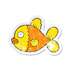 retro distressed sticker of a cartoon fish