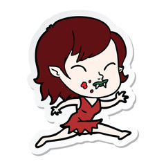 sticker of a cartoon vampire girl with blood on cheek