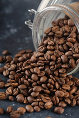  Coffee beans in glass jar . Closeup