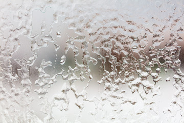 Ice on glass as abstract background