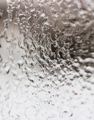 Ice on glass as abstract background