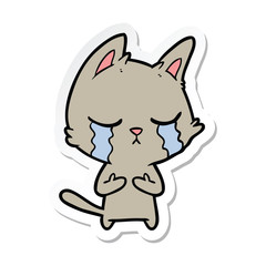 Obraz na płótnie Canvas sticker of a crying cartoon cat