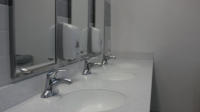 3 sinks in public bathroom 