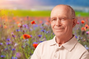 Portrait of senior man smiling at camera