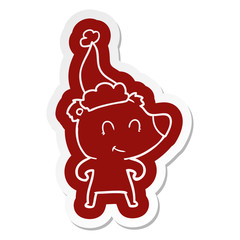 female bear cartoon  sticker of a wearing santa hat