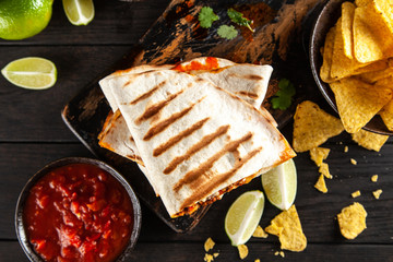 Chicken quesadillas with paprika, cheese and cilantro