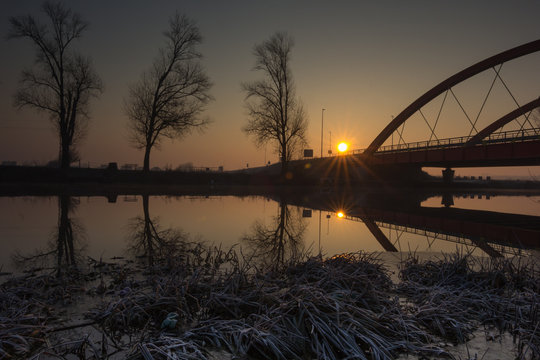 Red bridge over the Bosut river in Vinkovci, Croatia
