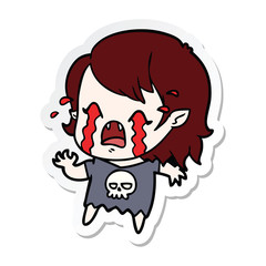 sticker of a cartoon crying vampire girl