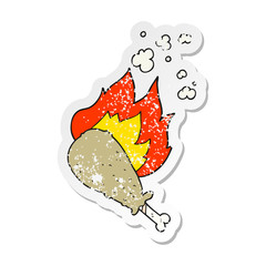 retro distressed sticker of a cartoon cooked chicken leg