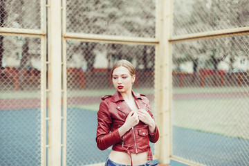 Blondie sexy pretty gorgeous beauty girl from sport support team posing on stadium before competition or game. Sport, active life, beauty concept