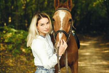 Obraz premium woman with horses