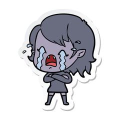 sticker of a cartoon crying vampire girl