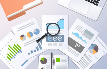 analysis financial results finance business chart graph diagram statistic concept top angle view desktop laptop paper documents report office stuff horizontal