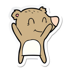 sticker of a smiling bear cartoon