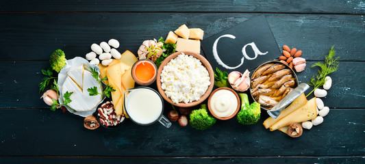 Products containing natural calcium: cheese, milk, parmesan, sour cream, fish, almonds, parsley,...