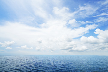 The blur cool sea background on horizon tropical sandy beach; relaxing outdoors vacation with...