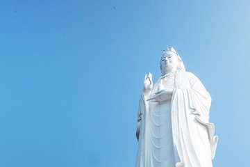 Fototapeta premium Lady Buddha Da Nang is located at Linh Ung Pagoda on Son Tra Peninsula in Da Nang which is 9 km away from My Khe beach, or 14 km from Da Nang city center.
