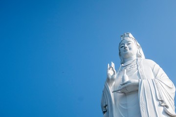 Fototapeta premium Lady Buddha Da Nang is located at Linh Ung Pagoda on Son Tra Peninsula in Da Nang which is 9 km away from My Khe beach, or 14 km from Da Nang city center.