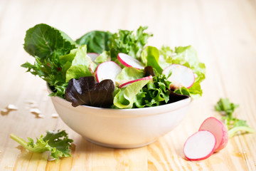Fresh vegetables salad with sesame dressing