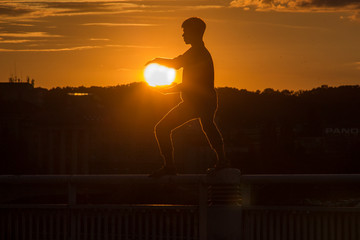 silhouette of a man at sunset
