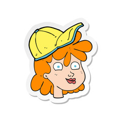 sticker of a cartoon female face wearing cap