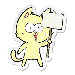 distressed sticker of a funny cartoon cat with sign