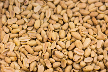 peanut fried nuts background texture surface in market counter, food wallpaper pattern concept