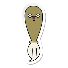 Fototapeta premium sticker of a cute cartoon paint brush