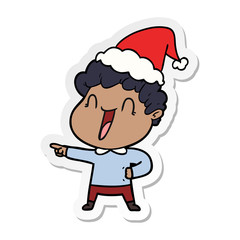 Obraz premium sticker cartoon of a happy man wearing santa hat