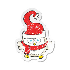 retro distressed sticker of a cartoon owl wearing christmas hat