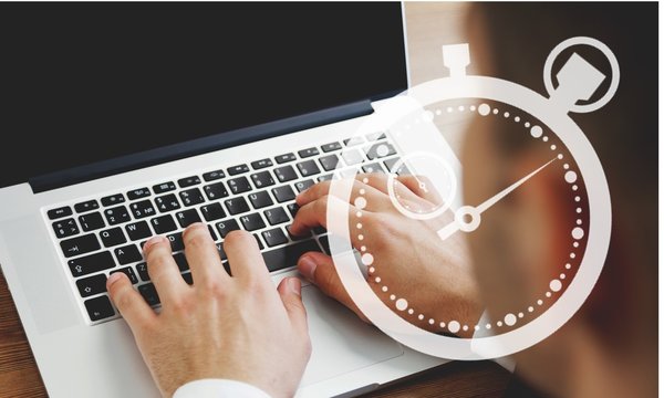 Woman typing computer.