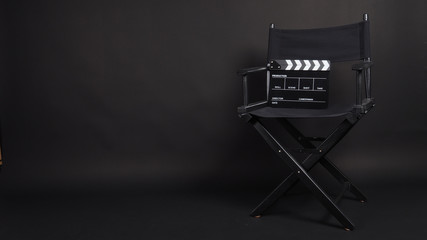 Clapper board or movie slate with director chair use in video production or movie and cinema...