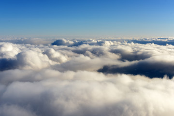 Fototapeta na wymiar clouds, top view from the plane