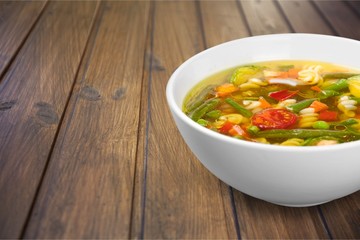 Vegetable soup isolated on a white background