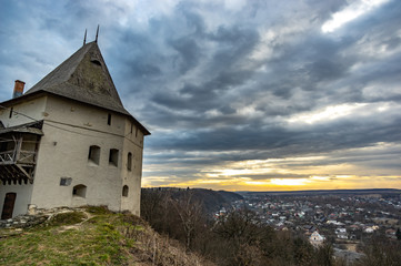 Fototapeta premium Tower of a medieval castle at sunset