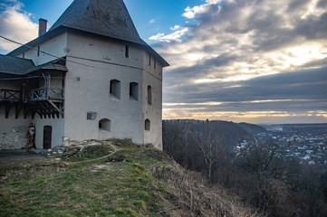 Fototapeta premium Tower of a medieval castle at sunset