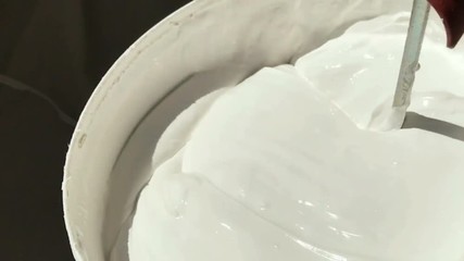 Stirring white color paint