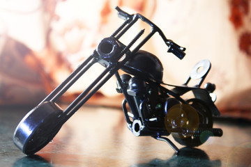 Fototapeta na wymiar Small Metal motorbike made out of scrap metal pieces