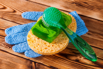Objects for care of face skin: handmade natural soap, a sponge, the peeling brush and a massage...