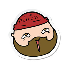 sticker of a cartoon male face with beard