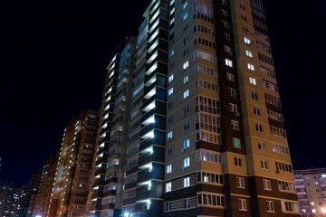 multi-storey residential building in the dark