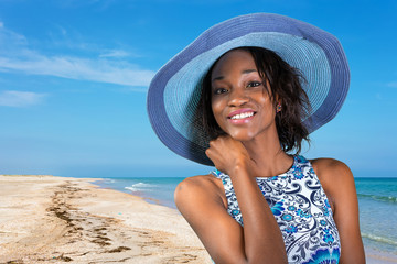 Beautiful young South African woman in blue hat close up