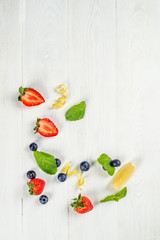 The frame of the berries shot on a white background from above